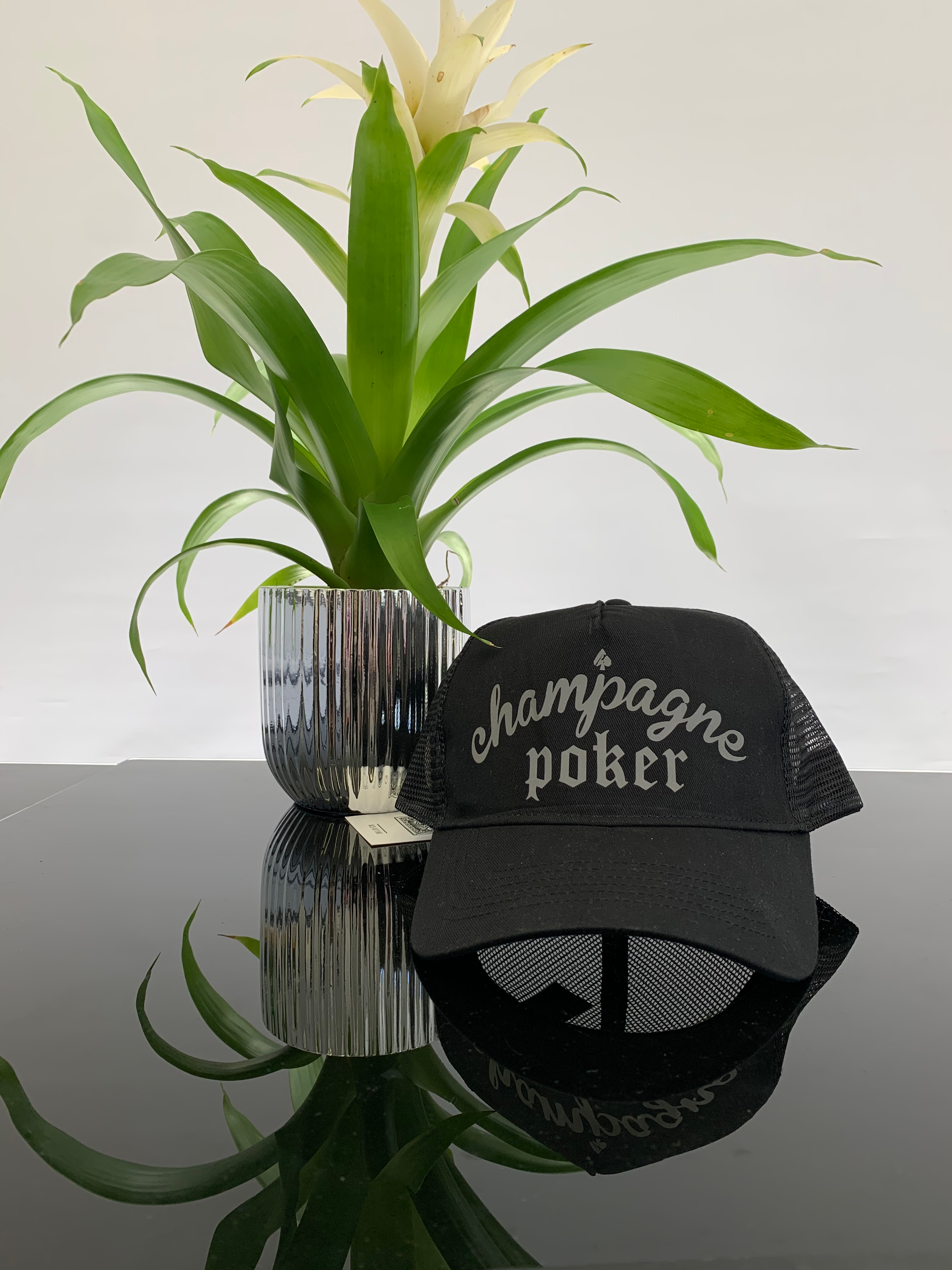 Signature reflective trucker